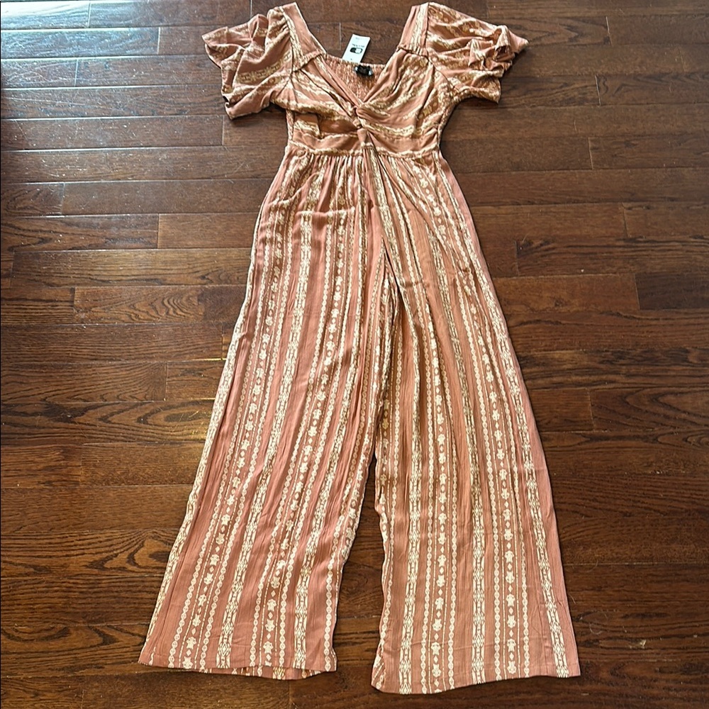 Brand New size medium Jumpsuit